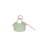 Louenhide Gina Bag Charm Sage Green shaped like a mini handbag with pink strap detail