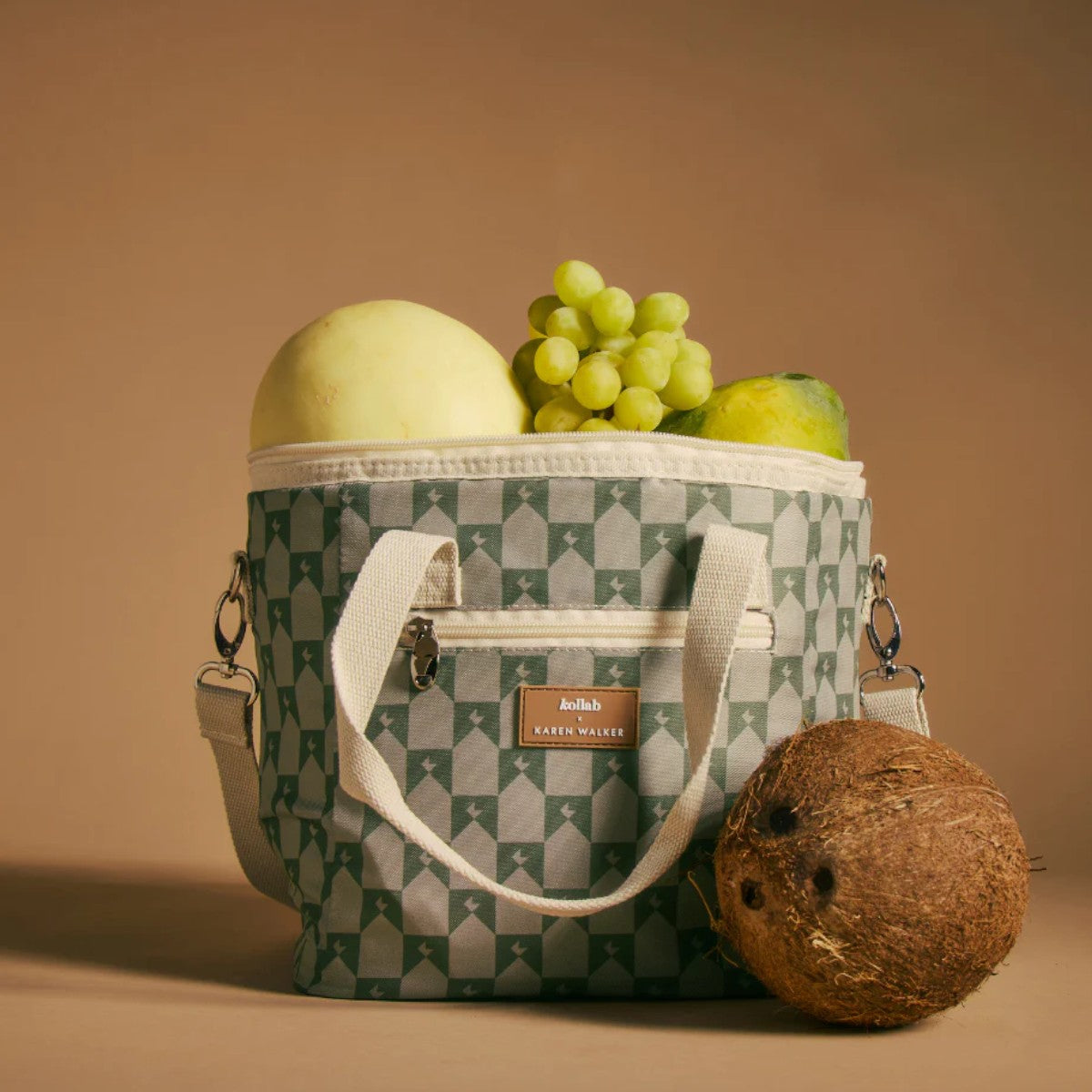 Kollab x Karen Walker Mini Cooler Sage Monogram | Minimax - with fruits inside and a coconut