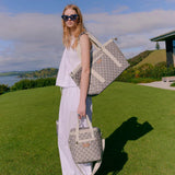 Kollab x Karen Walker Mini Cooler Sage Monogram | Minimax - with a woman wearing