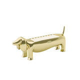 Umbra Dachsie Ring Holder Brass shaped like a dachshund with ridged tray along its back