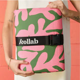 Kollab Picnic Mat Coral Canopy 2mx2m | Minimax - folded with a woman holding