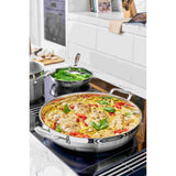 Scanpan Impact Chef's Pan and Frypan Set 28cm | Minimax - in the kitchen with pasta and vegetables