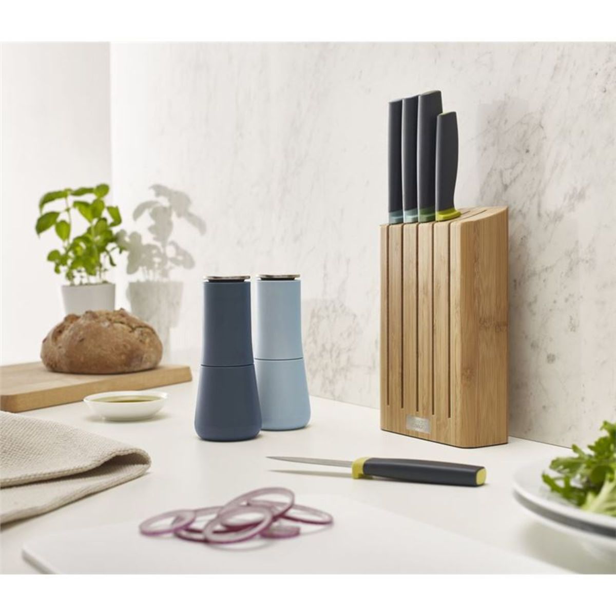 Joseph Joseph Milltop Salt & Pepper Mill Set Sky | Minimax - on kitchen counter