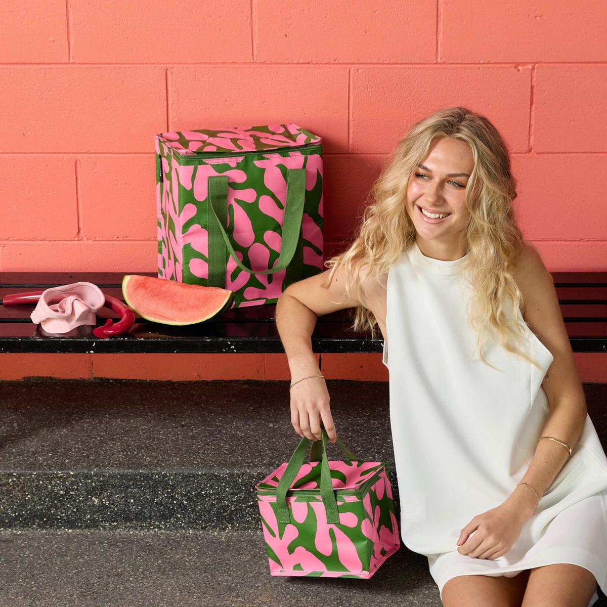 Kollab Cooler Bag Coral Canopy | Minimax - with a woman sitting beside