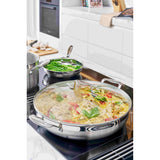 Scanpan Impact Chef's Pan and Frypan Set 28cm | Minimax - in the kitchen with pasta and vegetables