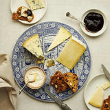 The Fine Cheese Co. Ceramic Cheese Plater 30cm | Minimax - with cheese and bread serve in a table