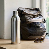 Aarke Stainless Steel Insulated Bottle 1L | Minimax - with a bag and sunglass