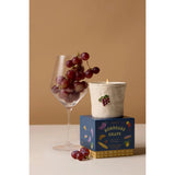 Paddywax Bistro Bordeaux Grape Ceramic Candle 226g | Minimax - with a glass of grapes and packaging box