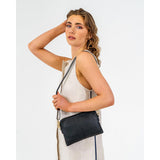 ELMS and KING Bowery Wallet Black Pebble | Minimax - with a woman