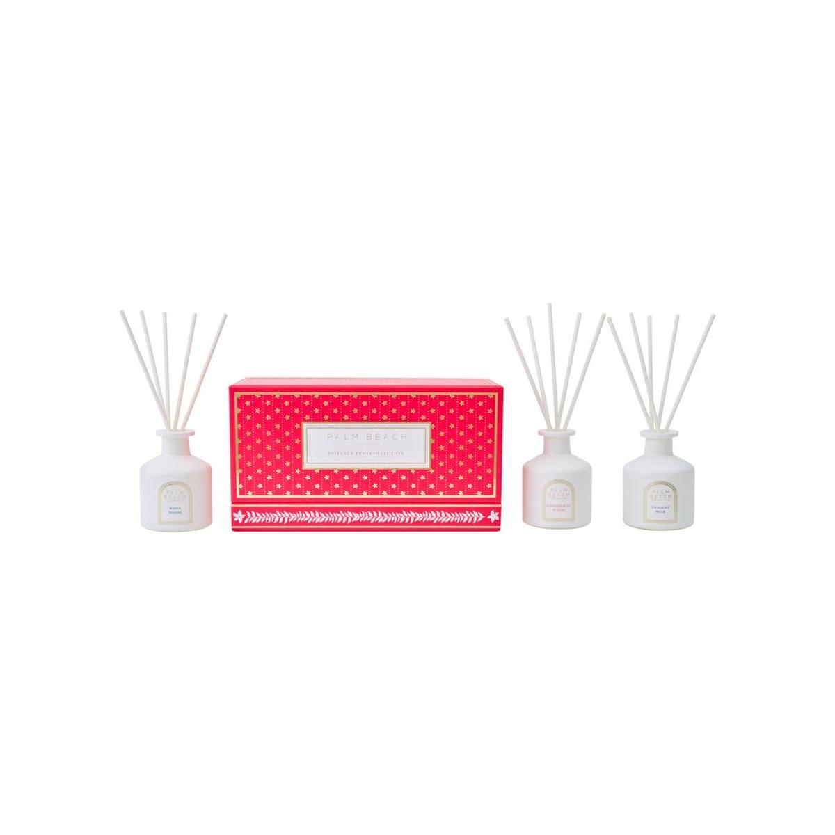 Palm Beach Collection Mini Diffuser Trio Gift Set – three 50ml fragrance diffusers in festive red box, perfect holiday gift.