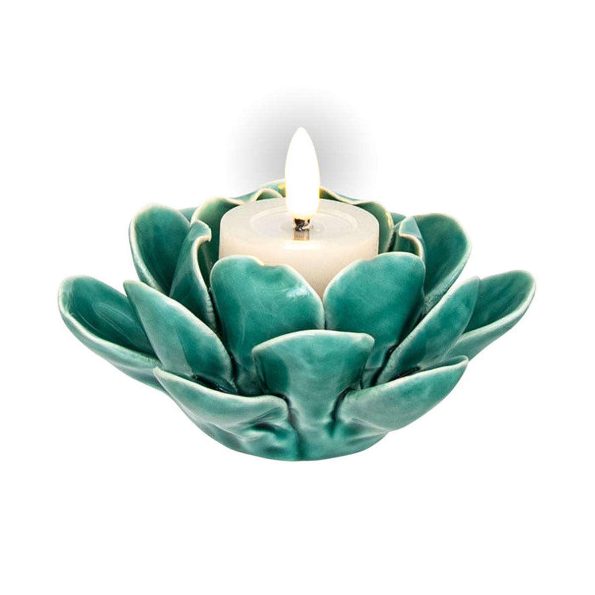 Swing Gifts Ceramic Tea Light Holder Spring Green with lily-shaped petals holding a small candle