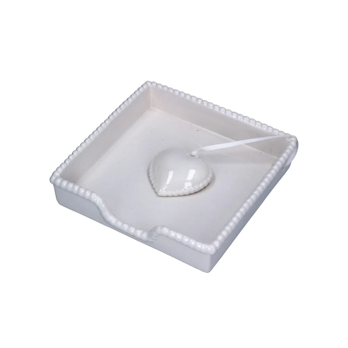 Ceramic Heart Napkin Holder White displayed with blue patterned napkins on wooden table