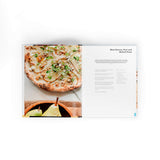 Cooking with Ooni Cookbook by Kristian Tapaninaho and Darina Garland, featuring Ooni pizza oven recipes, stories, and cooking inspiration