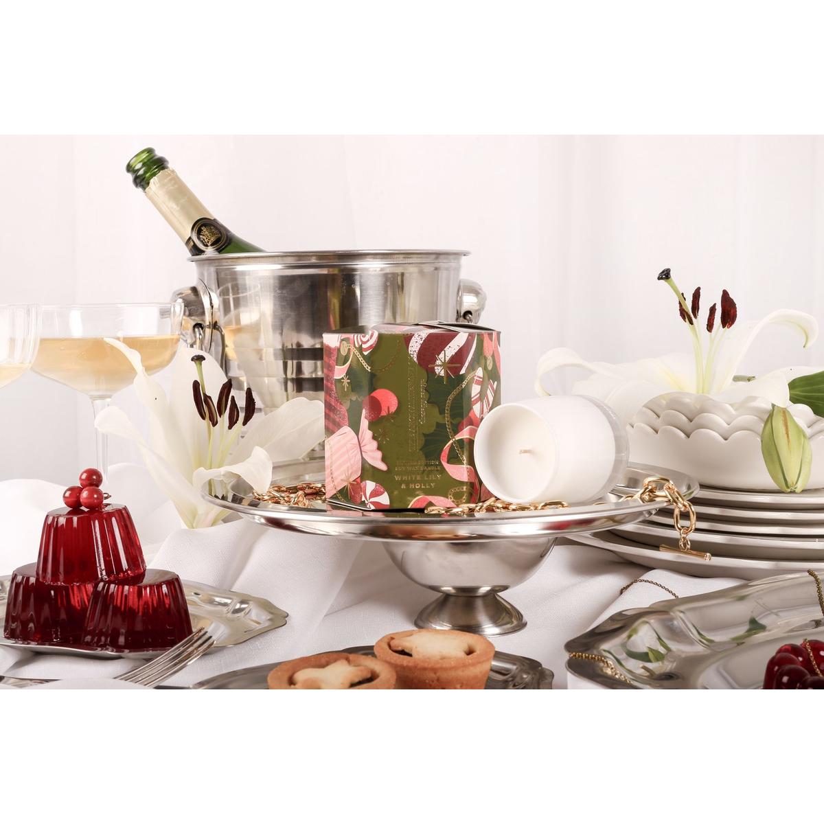 The Aromatherapy Co. White Lily & Holly Candle 80g – festive soy wax candle in white glass jar with seasonal green and red gift box