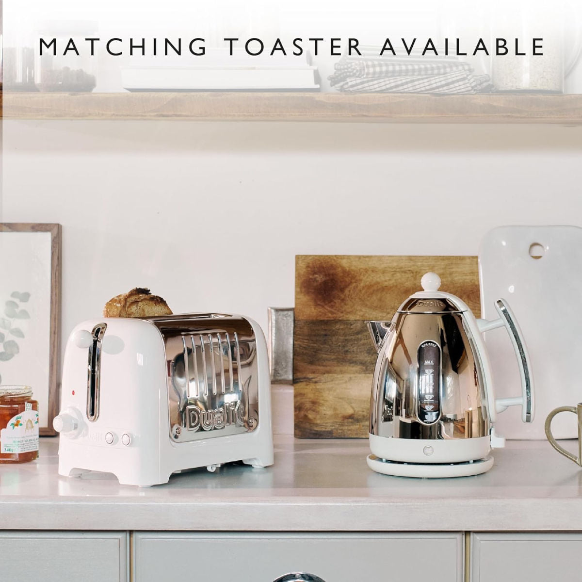 Dualit Lite Kettle White 1.5L with polished stainless steel body, ergonomic handle, and water level indicator