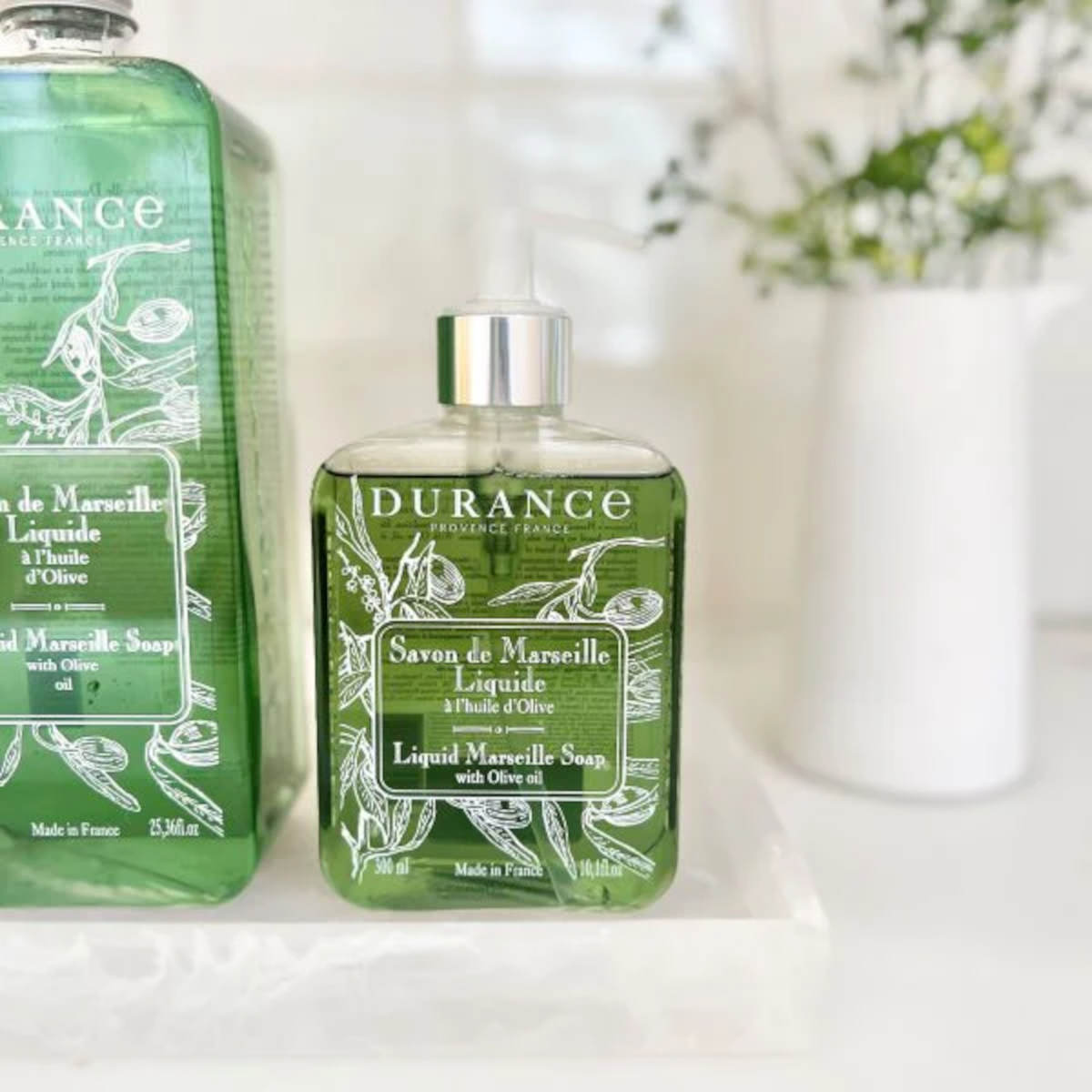 Durance Olive Liquid Soap 300ml, clear bottle of liquid hand soap with pump dispenser and olive branch label