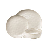 Angled view of Ecology Marie Dinner Set Wheat 12 Piece including plates and bowls on white background