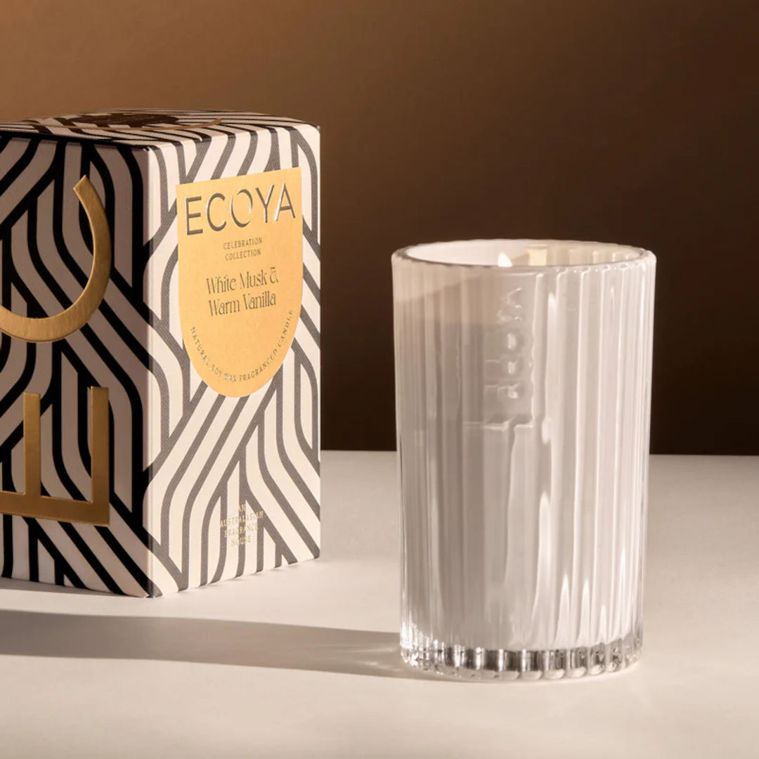 Ecoya White Musk & Warm Vanilla Celebration Candle 345g, large scented candle in glass jar with decorative label on white background