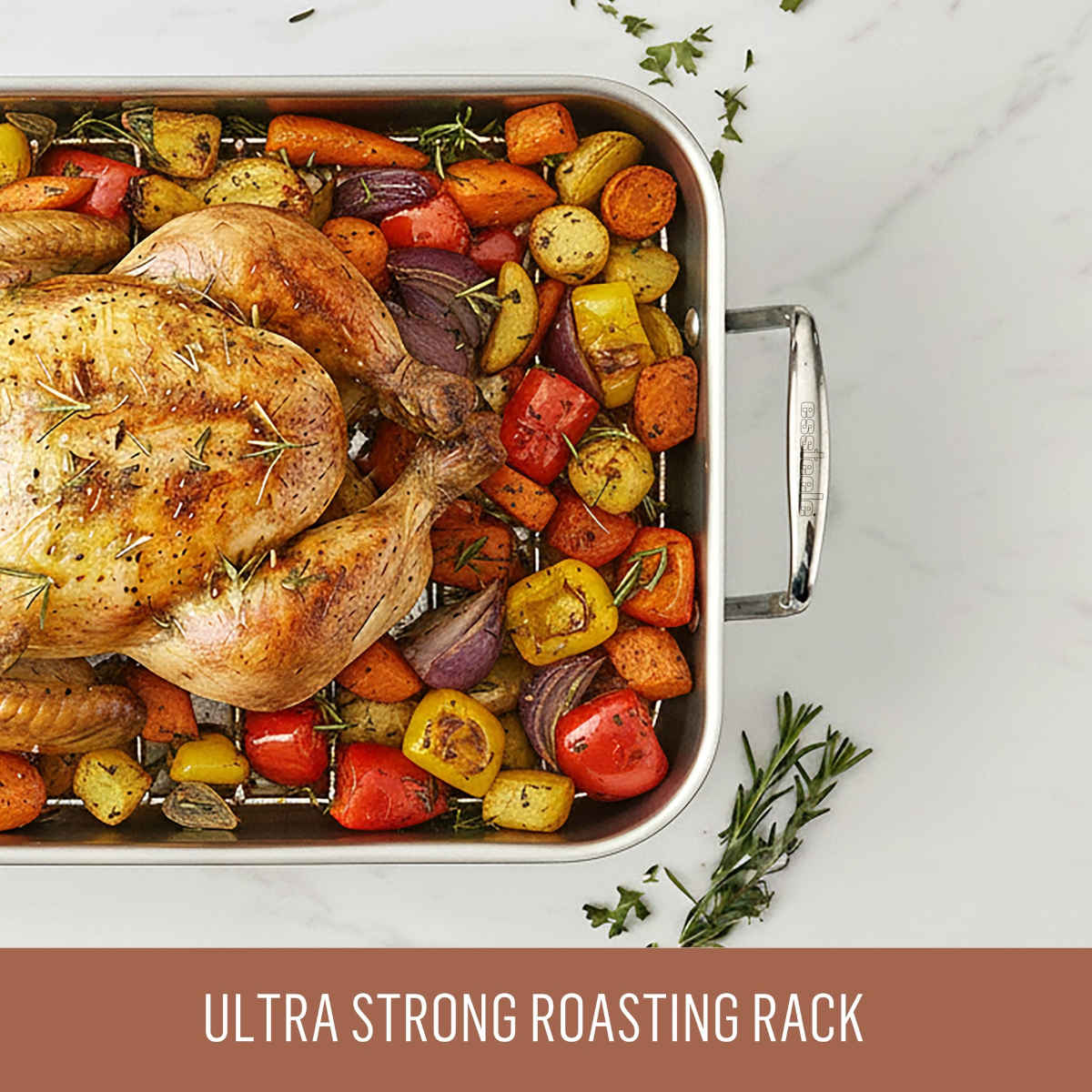 Close-up of Essteele Stainless Steel Roaster with roast chicken and vegetables, ultra strong rack text