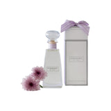 Complete diffuser set with bottle and packaging, finished with a lilac ribbon