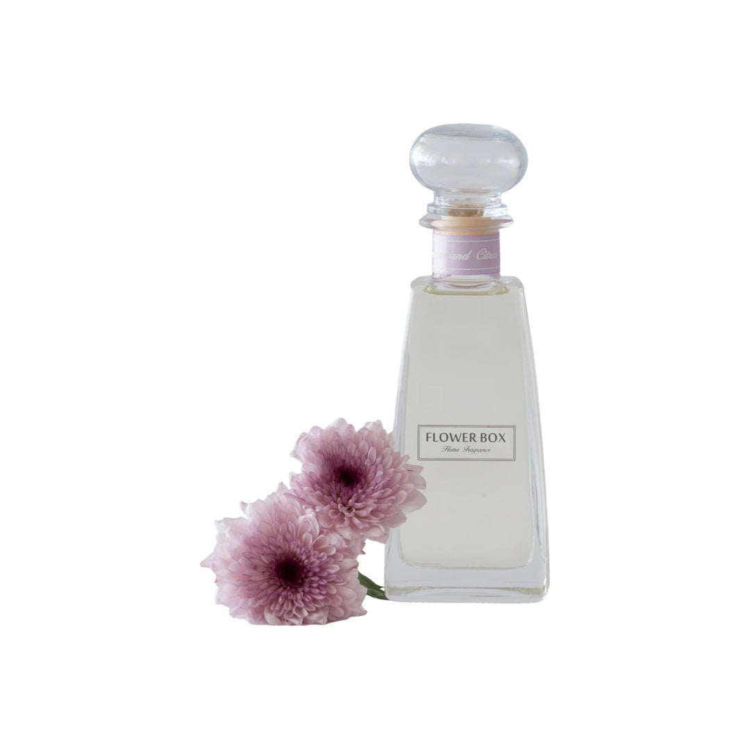 Elegant jasmine & citrus blossom diffuser bottle with delicate flower styling
