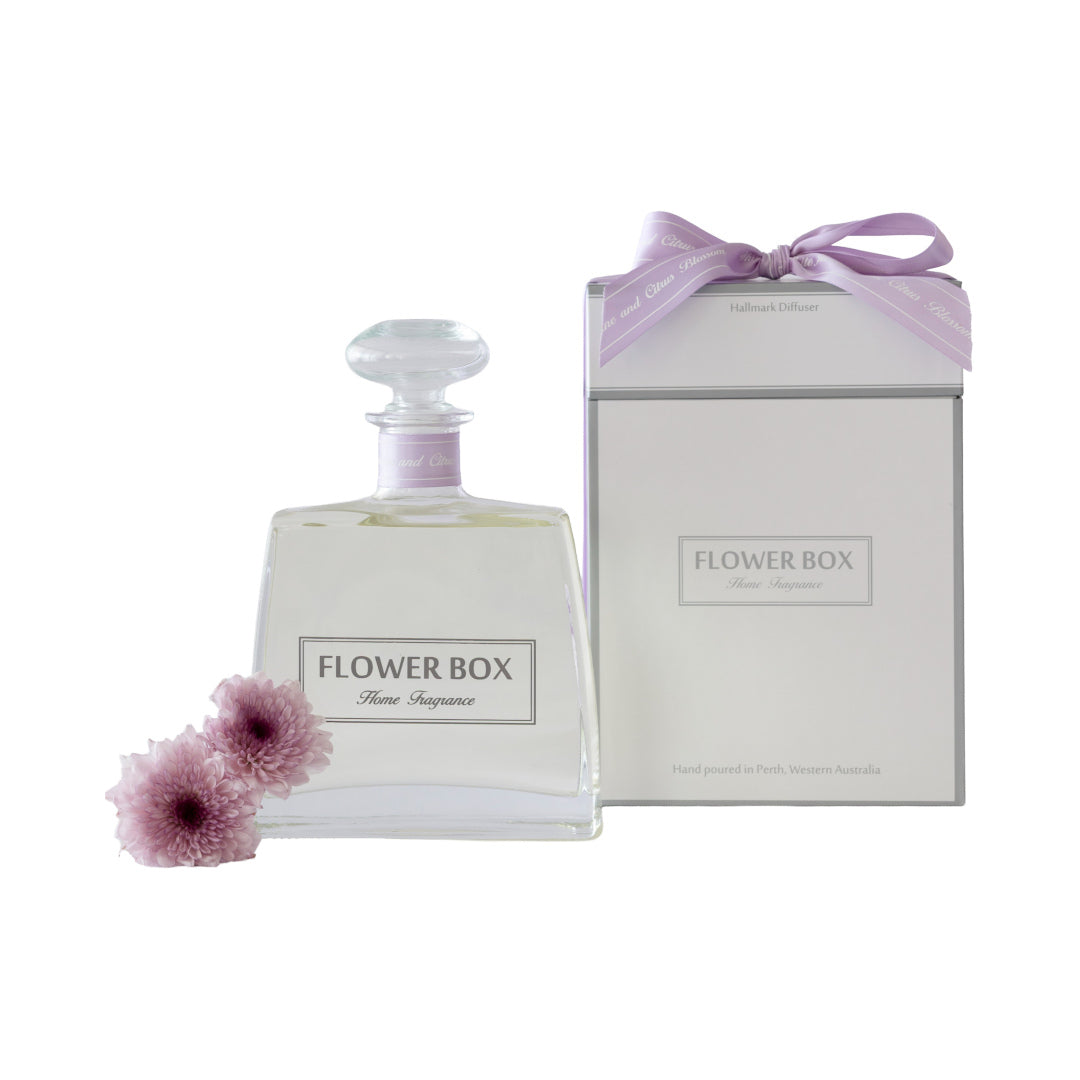 Premium diffuser bottle paired with elegant gift box finished with a lilac ribbon
