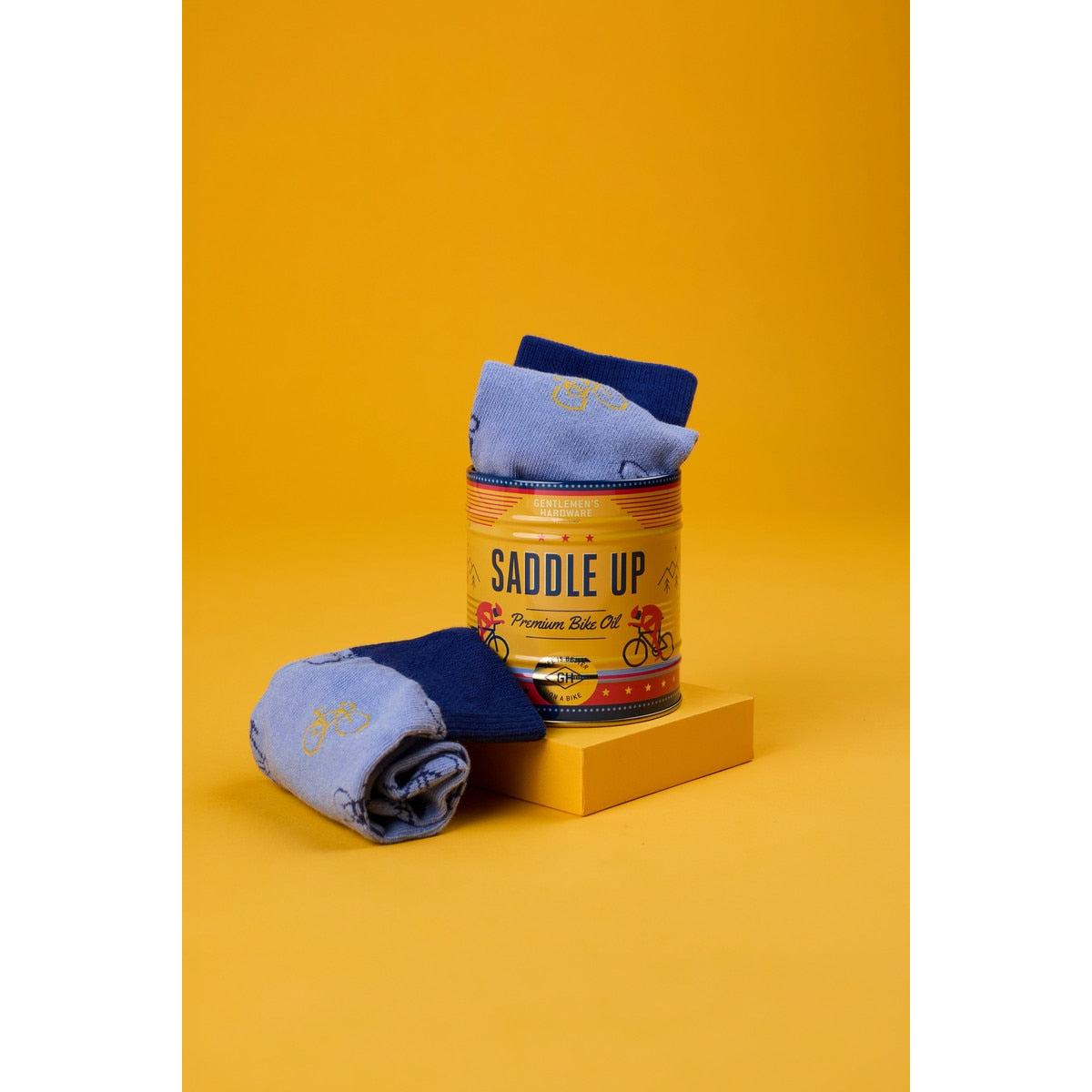 Gentlemen’s Hardware Saddle Up Socks in a Tin Can featuring vintage yellow bike-themed design