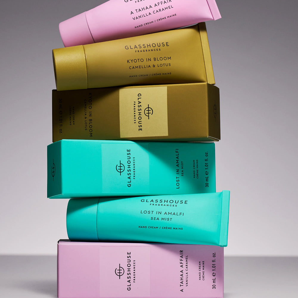 Glasshouse Fragrances Hand Cream Trio 30ml beautifully styled with coordinating tubes and gift boxes, highlighting the luxurious collection of A Tahaa Affair, Lost in Amalfi and Kyoto in Bloom hand creams.