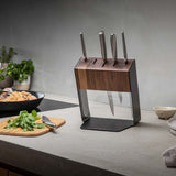 Global Katana knife block set on kitchen bench, walnut block with stainless steel knives in modern kitchen setting