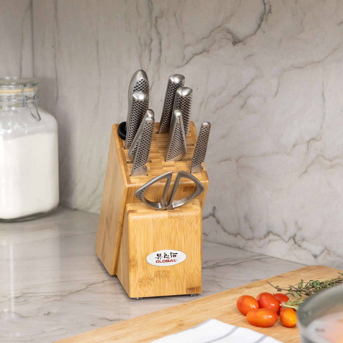 Global Takashi Knife Block Set 10 Piece with stainless steel knives, kitchen shears, sharpening steel, and bamboo storage block