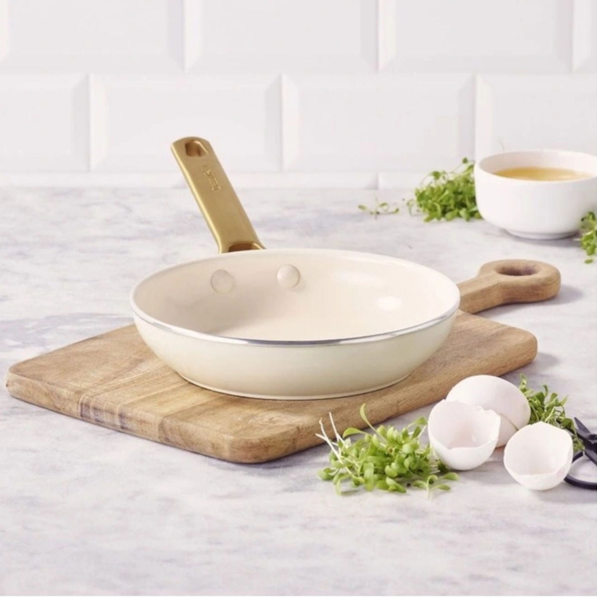 Image 2: GreenPan Padova Frypan Cream 20cm – styled on a wooden board with eggshells and greens