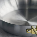 GreenPan Stanley Tucci Stainless Steel Stanley Pan 33cm (6.2L) with glass lid and gold handles on white background