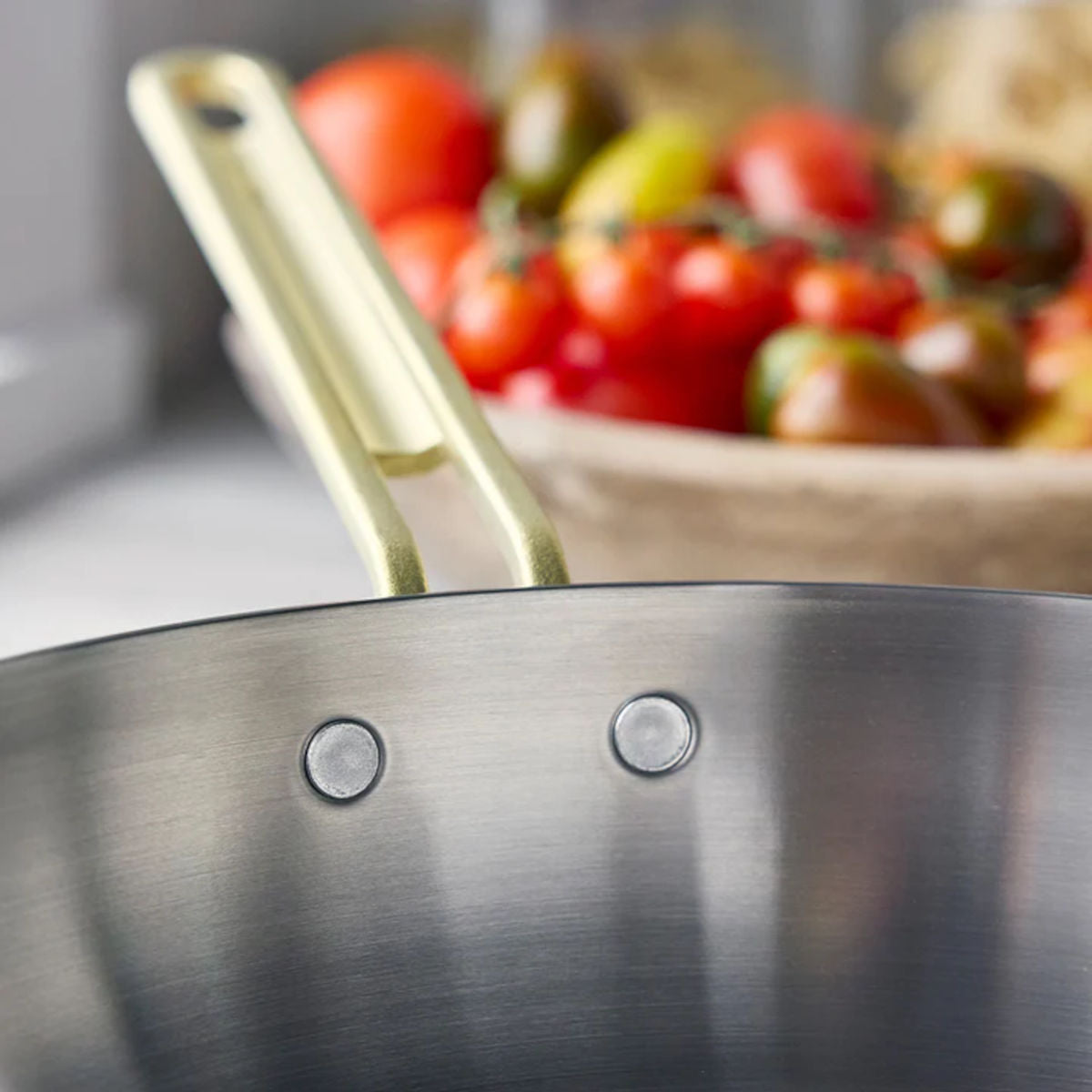 GreenPan Stanley Tucci Stainless Steel Stanley Pan 33cm (6.2L) with glass lid and gold handles on white background