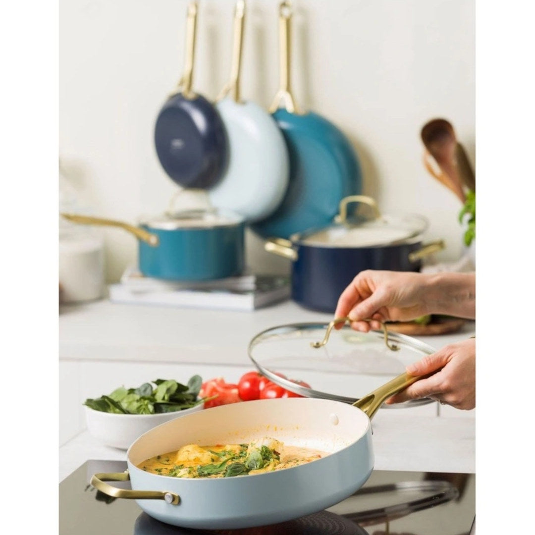 Greenpan Coastal Shades Cookware Set 6 Piece, angled view of cookware set including pots and pans in pastel tones