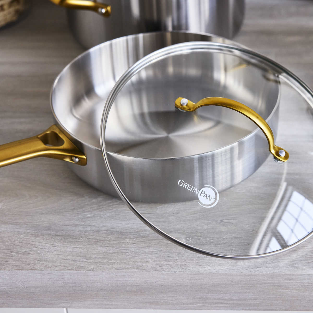 GreenPan Padova Stainless Steel Sauté Pan 24cm – open lid view on countertop