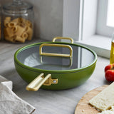 GreenPan Stanley Tucci Pan Junior Green – angled kitchen view with lid fully covering pan