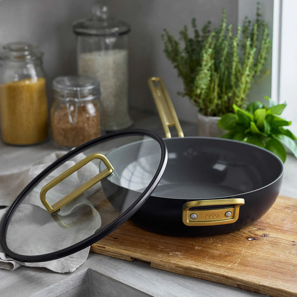 GreenPan Stanley Tucci Pan Junior Oxford Blue – angled kitchen view with glass lid off