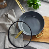 GreenPan Stanley Tucci Pan Junior Oxford Blue – top view pan with lid and kitchen towel