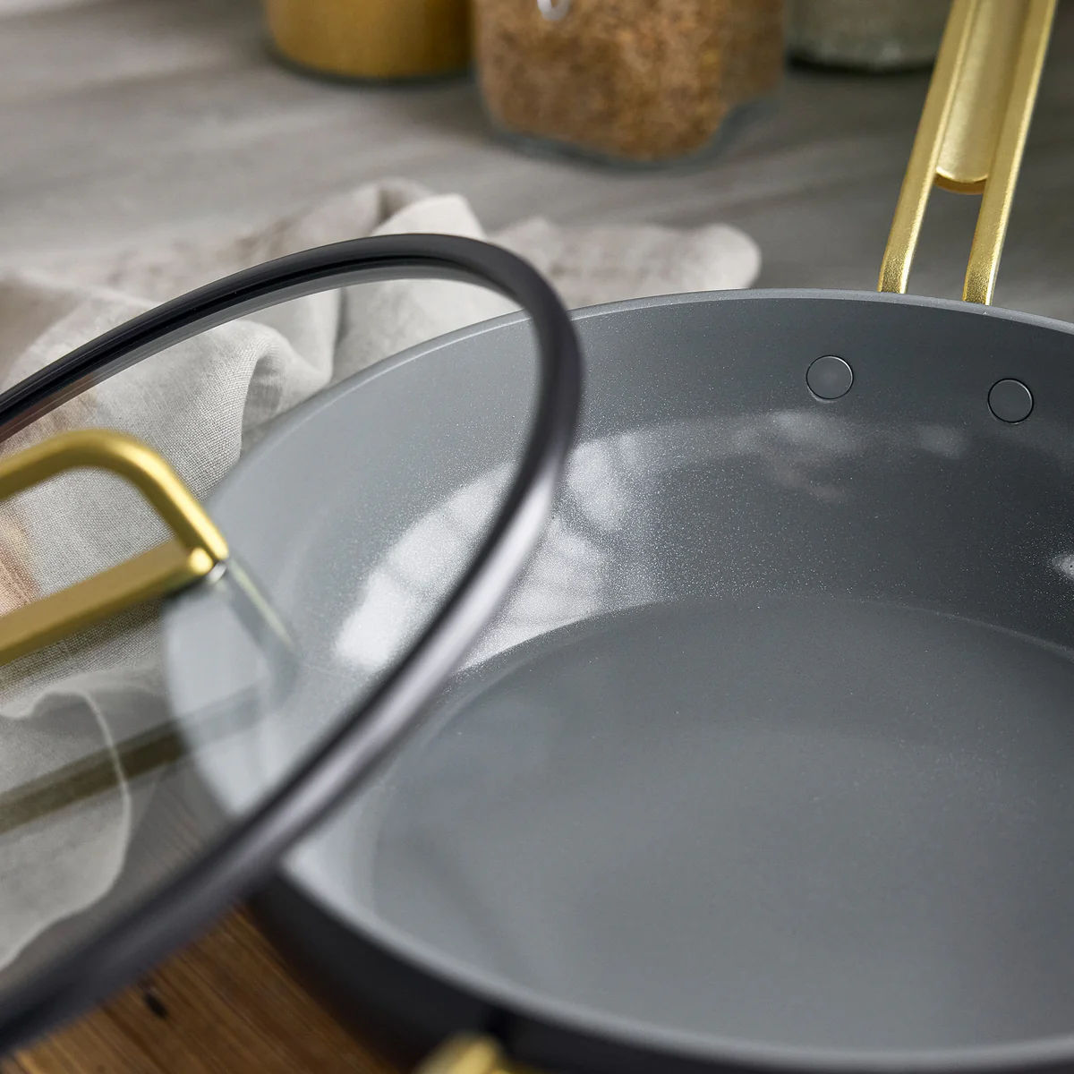 GreenPan Stanley Tucci Pan Junior Oxford Blue – interior with glass lid resting nearby