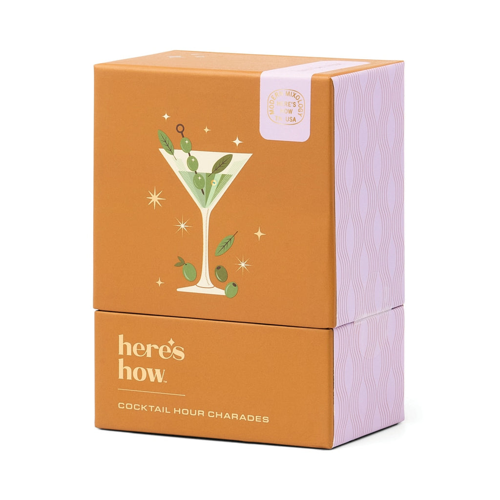 Here’s How Cocktail Hour Charades box featuring martini glass illustration on orange and lavender packaging