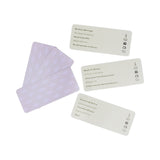 Here’s How Cocktail Hour Charades box featuring martini glass illustration on orange and lavender packaging