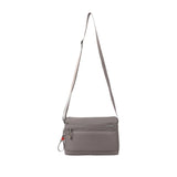 Hedgren Inner City Eye Neo Crossbody Bag in Sepia, shown front-on with an adjustable shoulder strap and dual front zip compartments.