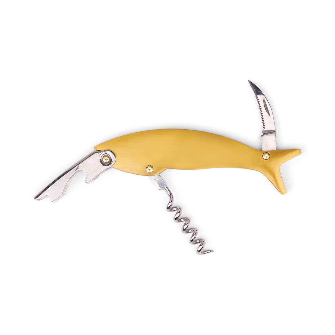 Here’s How The Maple Wine Bottle Opener featuring a playful fish-shaped design in brushed gold with integrated corkscrew, foil cutter, bottle opener, and folding serrated knife.