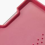 Joseph Joseph Cut & Carve Plus Multi-function Chopping Board Red XL with angled cutting surface, spikes, and juice-catching edges