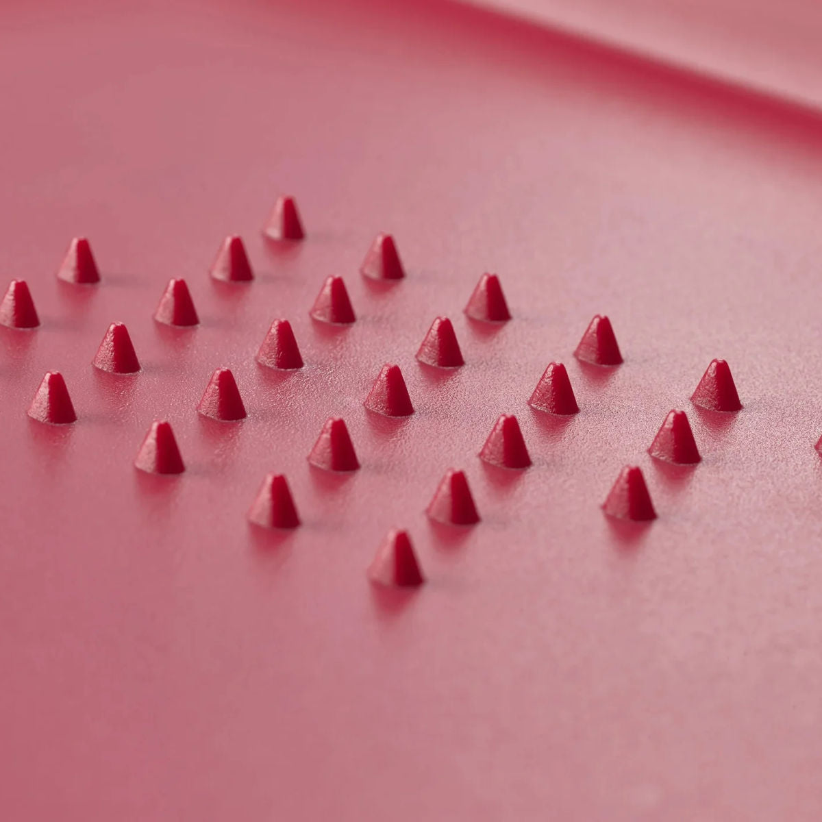 Joseph Joseph Cut & Carve Plus Multi-function Chopping Board Red XL with angled cutting surface, spikes, and juice-catching edges