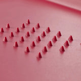 Joseph Joseph Cut & Carve Plus Multi-function Chopping Board Red XL with angled cutting surface, spikes, and juice-catching edges