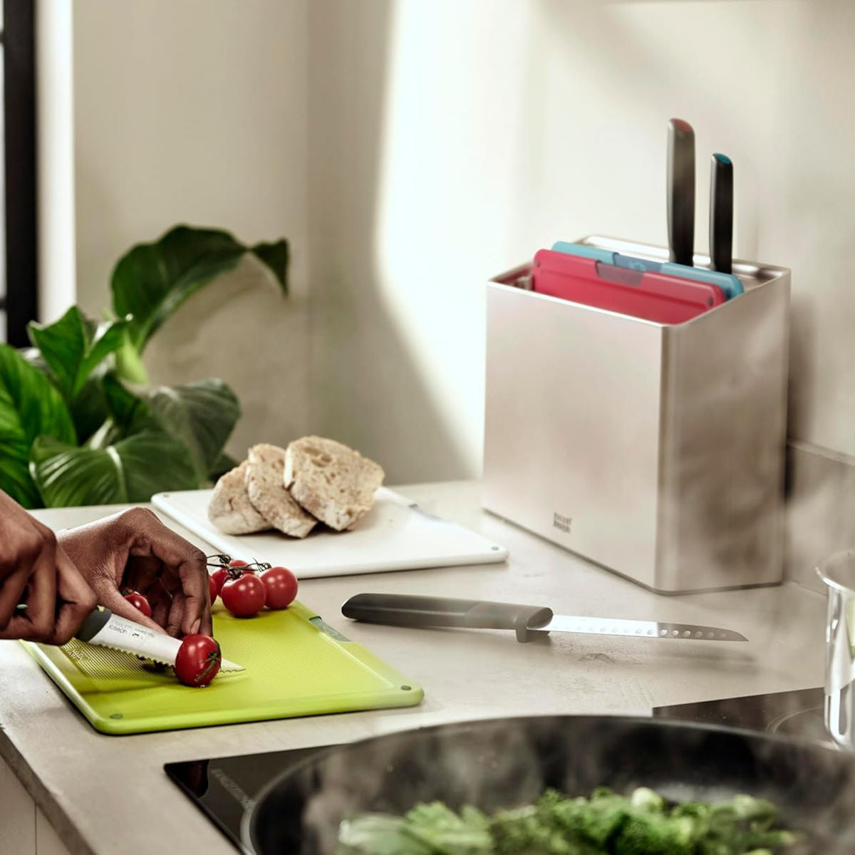 Joseph Joseph Folio Icon 8-piece board and knife set with colour-coded chopping boards and knives in holder