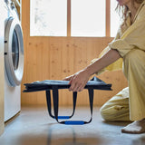Folding the basket flat for compact storage