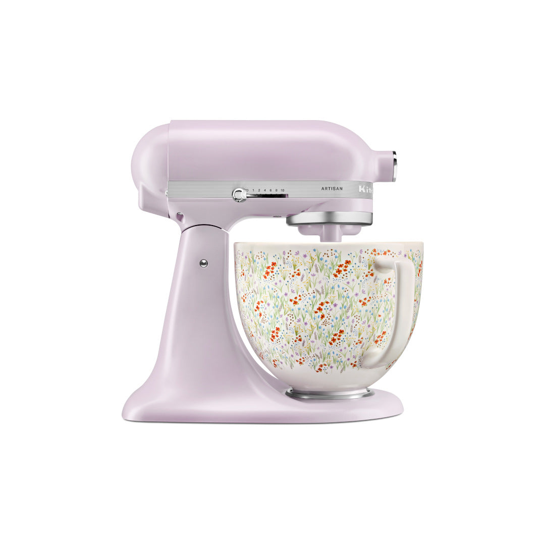 KitchenAid Artisan tilt-head stand mixer in pastel purple with wildflower patterned bowl