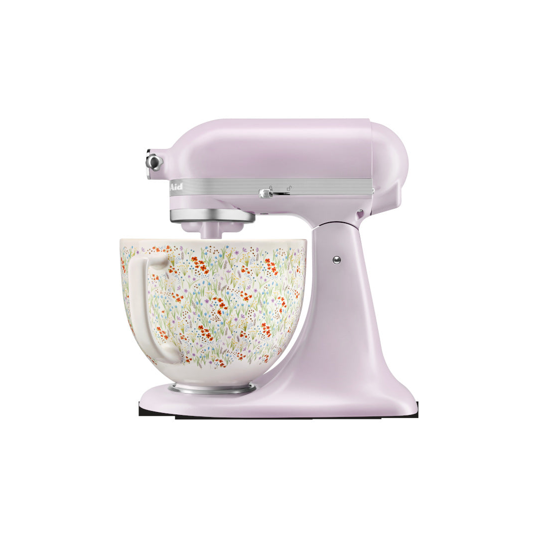 KitchenAid Artisan tilt-head stand mixer in pastel purple with wildflower patterned bowl